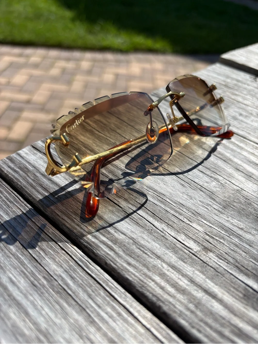 Cartier Men's Rimless Sunglasses with Gold Frame and Brown Lenses